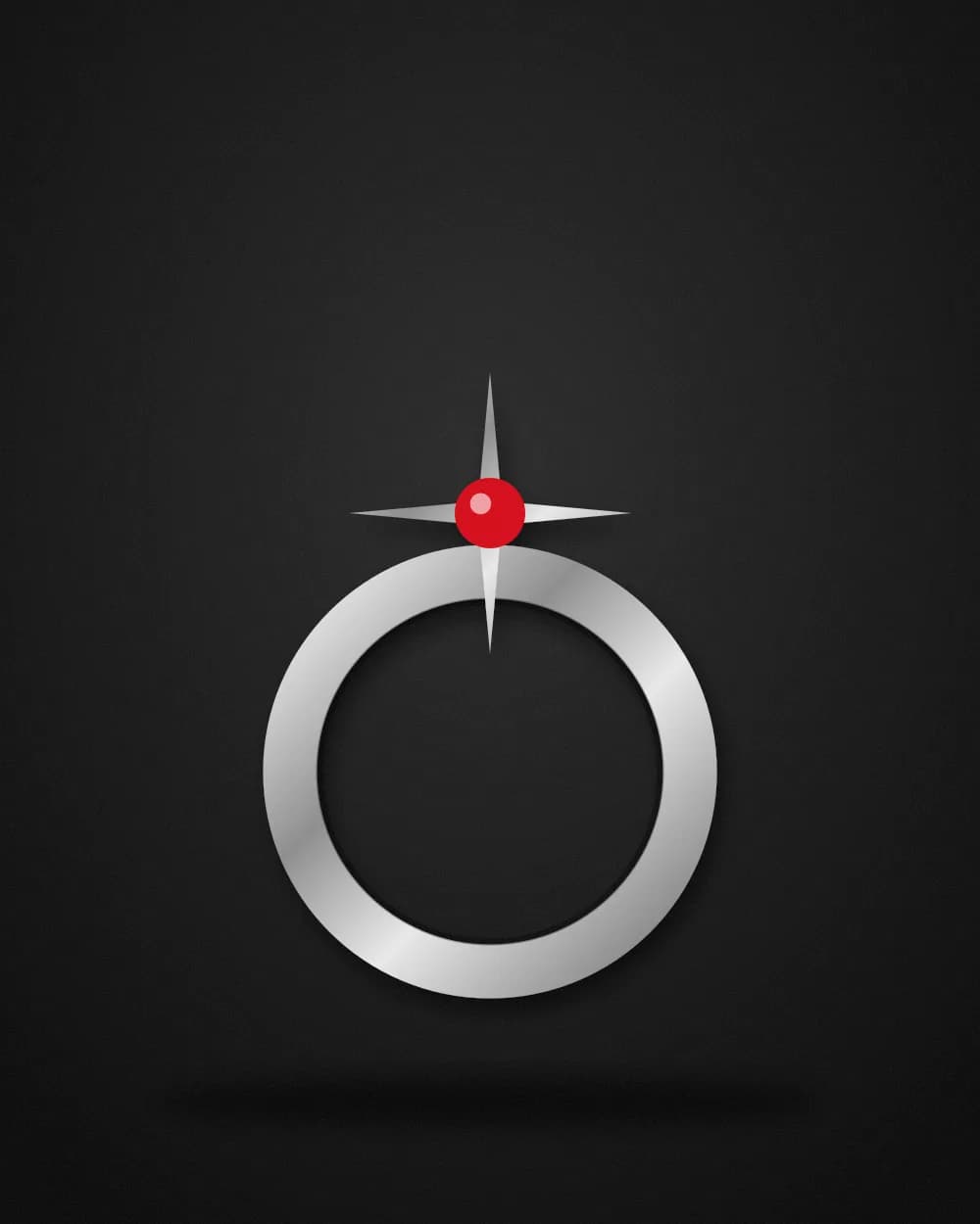 Silver ring with a spiked star setting and red stone